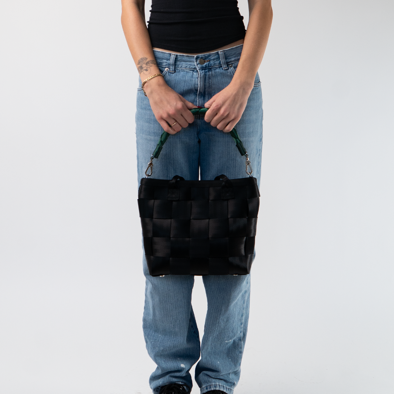 A Forest Lola Click N Carry being used by a model