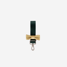 The front of a Forest N Gold Bow Keychain
