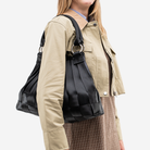 The Large Stella in Black being worn by a model