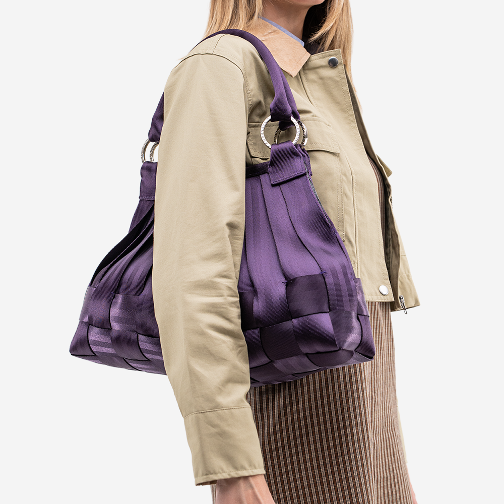 The Large Stella in Blackberry being worn by a model
