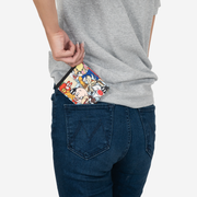 Looney Tunes billfold being pulled out of a back pocket