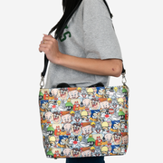 looney tunes medium streamline tote being worn on a models shoulder