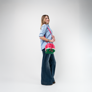 A Watermelon Medium Park Hopper being used by a model