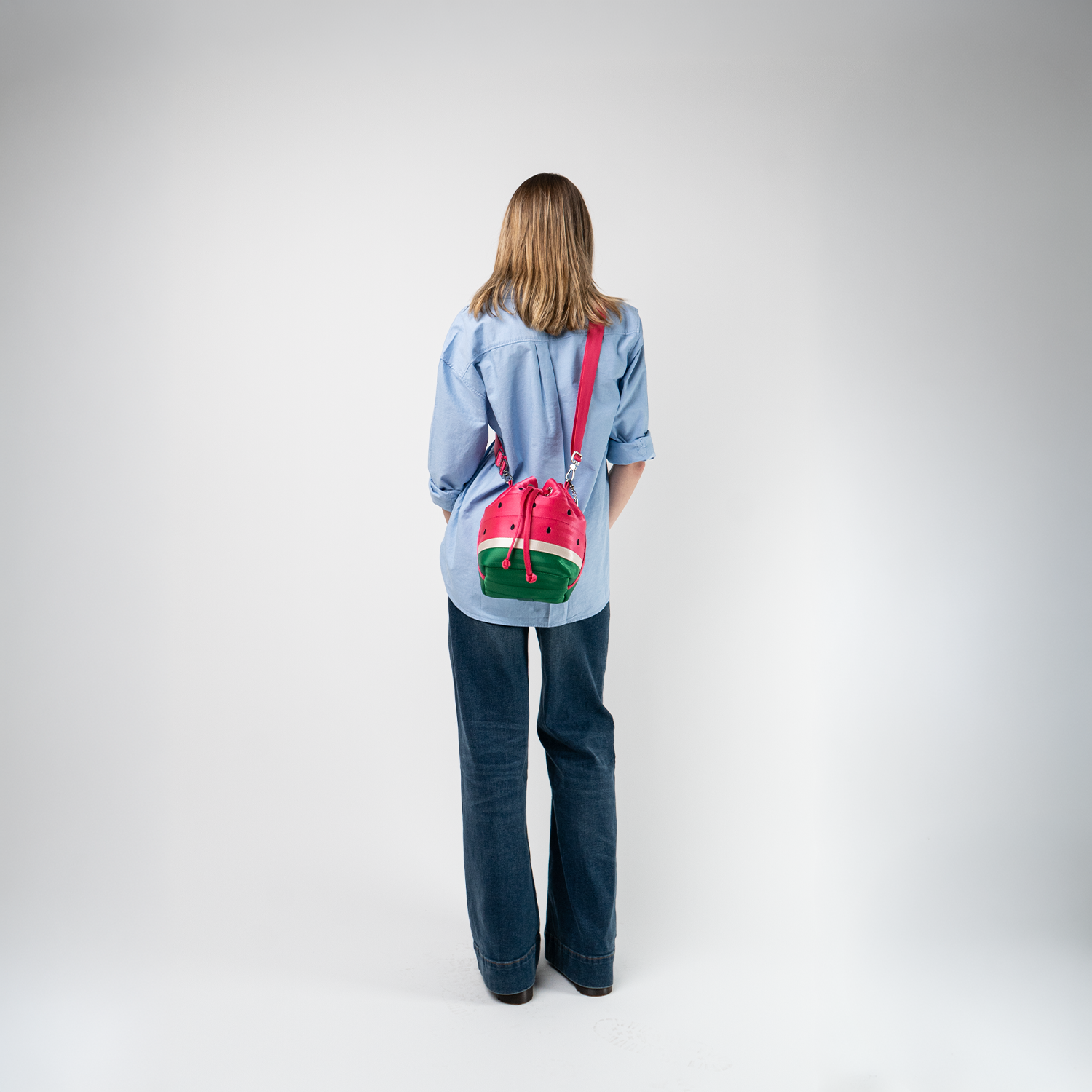 A Watermelon Medium Park Hopper being used by a model