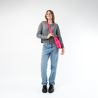 A Mini Messenger in Melon being worn by a Model