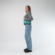 The Mint N Emerald Hip Pack being worn by a model