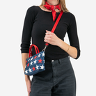 The RWB Stars Petite Tote being worn by a model