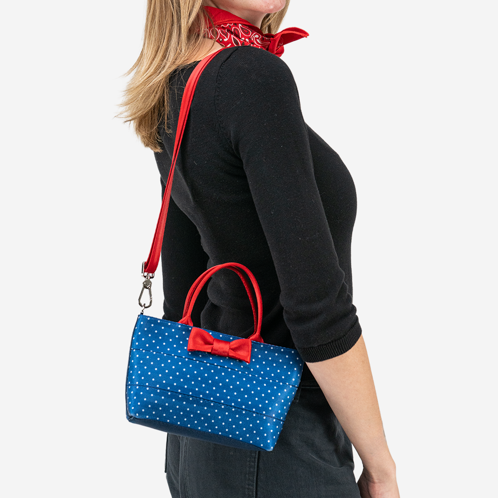 The Scarlet and Blue Dottie Petite Tote being worn by a model