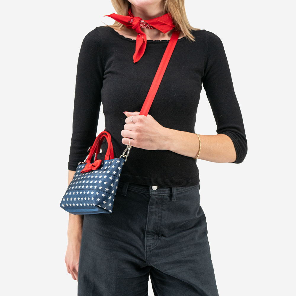The Scarlet and Stars Petite Tote being worn by a model