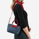 The Scarlet and Stars Petite Tote being worn by a model