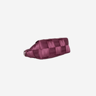 The bottom of a Plum Triangle Makeup Case