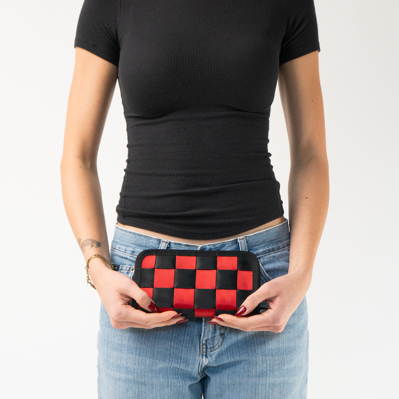 The Queen Of Hearts Full Wallet in a models hands