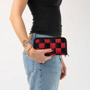 The Queen Of Hearts Full Wallet in a models hand