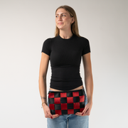 The Queen Of Hearts Large Hip Pack in a models hands