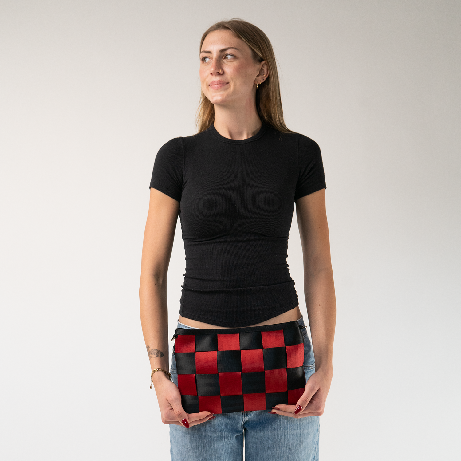 The Queen Of Hearts Large Hip Pack in a models hands