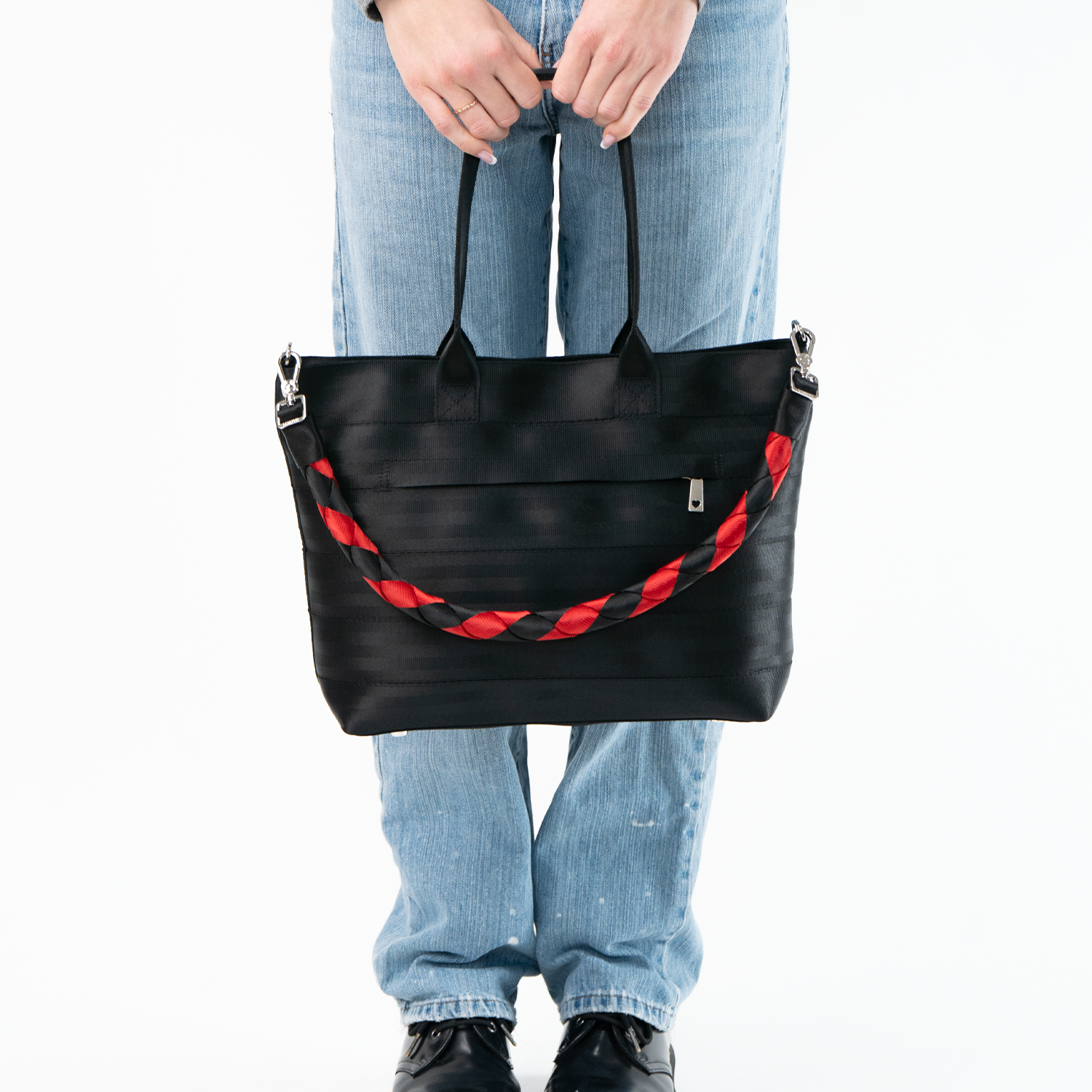 The Queen of Hearts Long Lola Click N Carry on a bag being used by a model