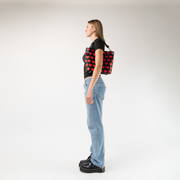 The Queen Of Hearts Medium Hobo being worn by a model