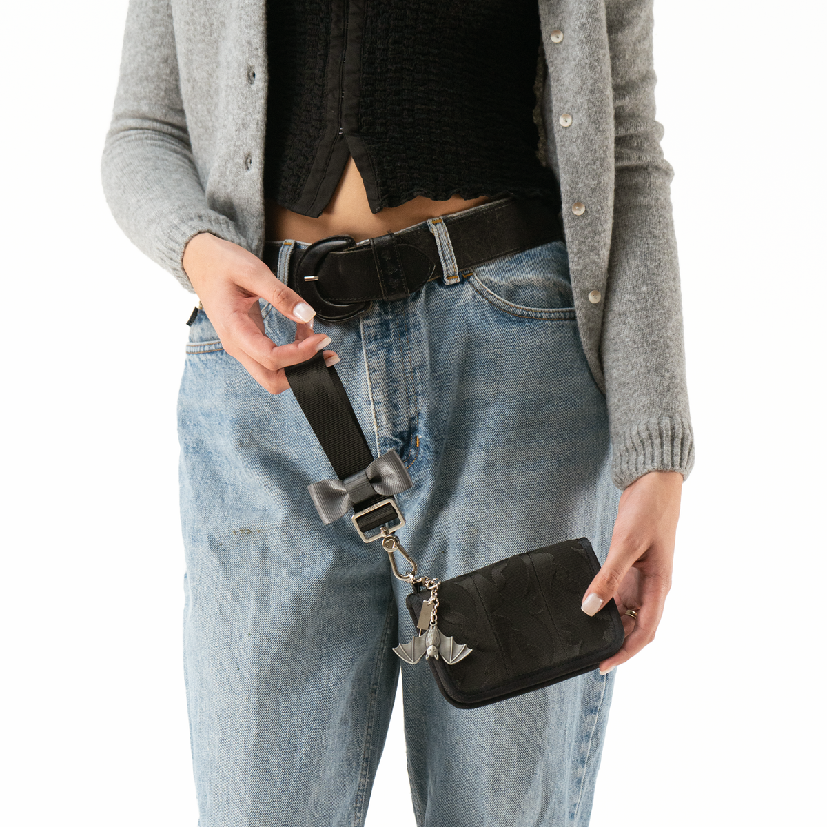 Release The Bats Bow Keychain on a wallet