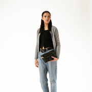 Release The Bats Makeup-case in a model's hands