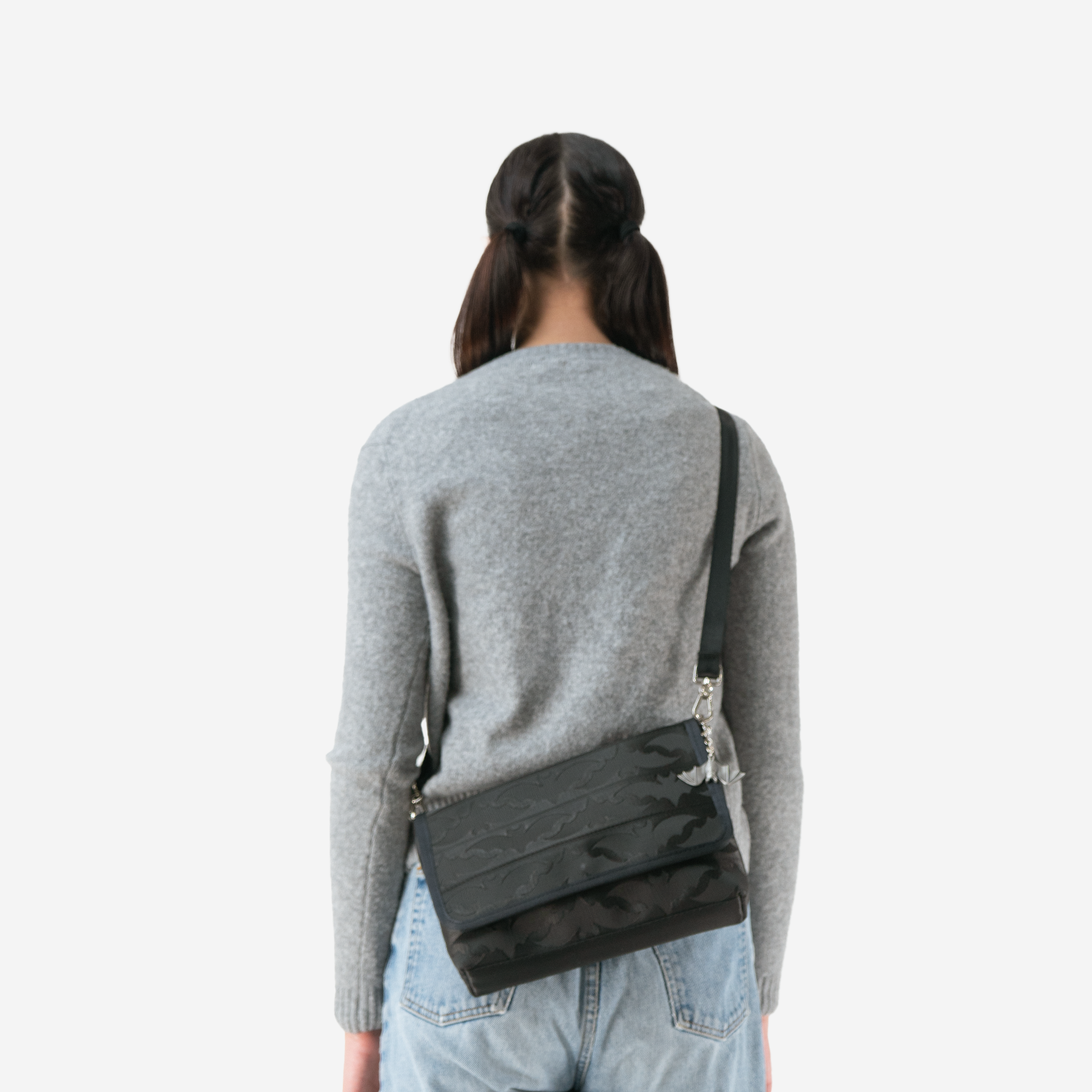 Release The Bats Medium foldover Crossbody on a model