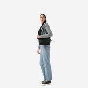 Release The Bats Medium foldover Crossbody on a model