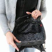 Release The Bats Mini Bow Tote in a model's hands