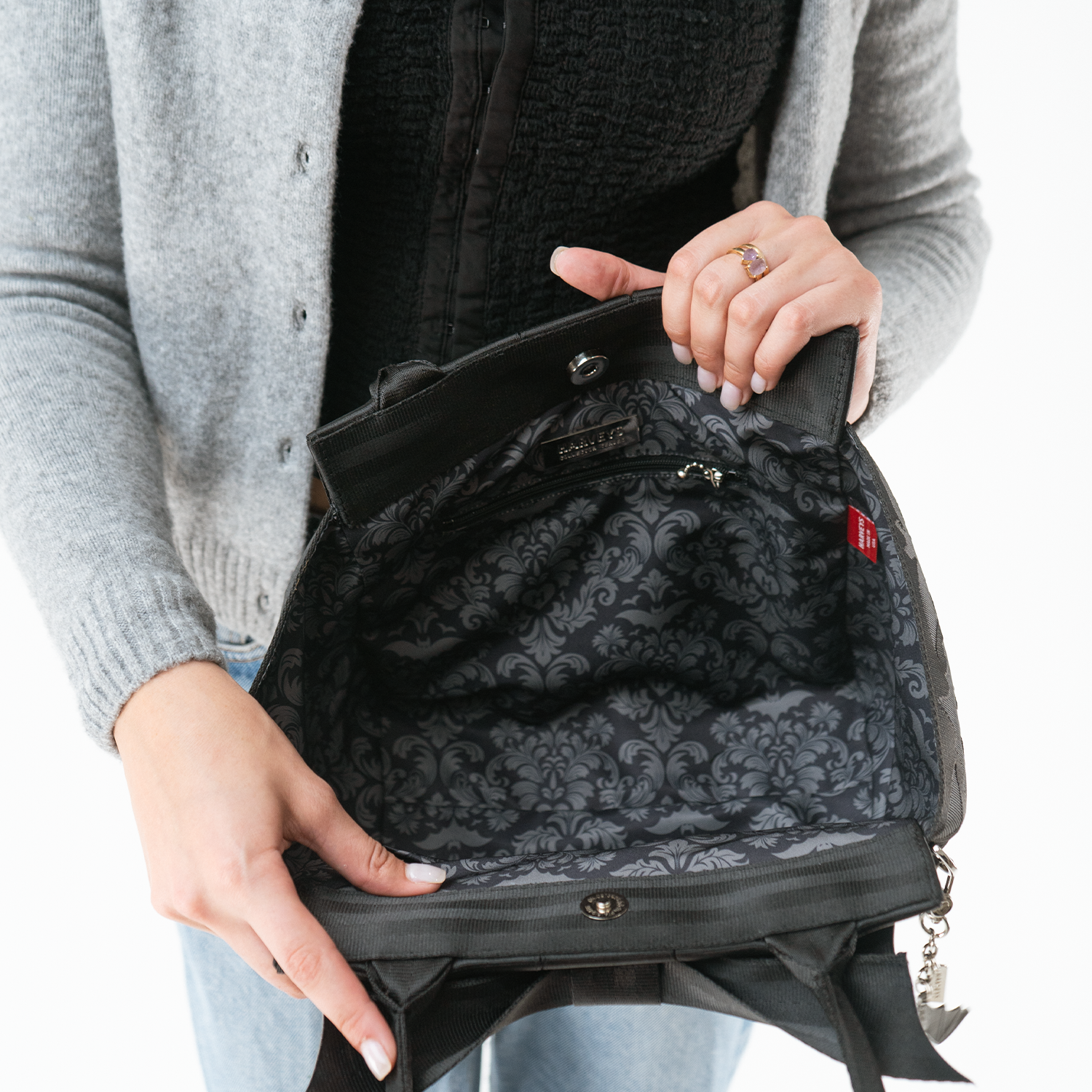 Release The Bats Mini Bow Tote in a model's hands