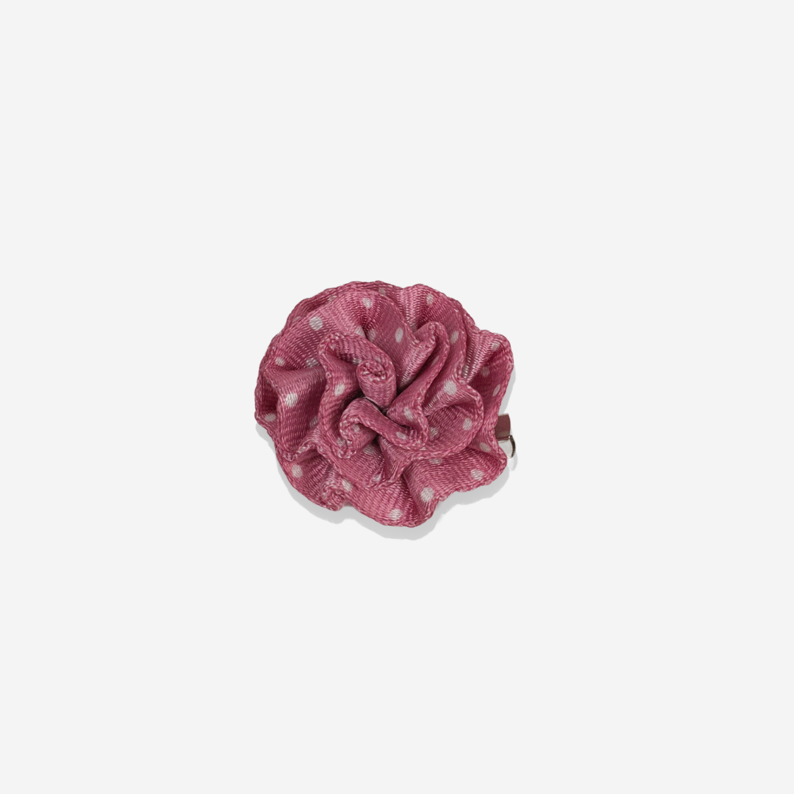 a Pink Dottie Mystery Rosette Clip