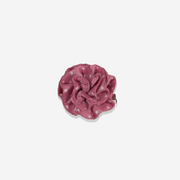 a Pink Dottie Mystery Rosette Clip