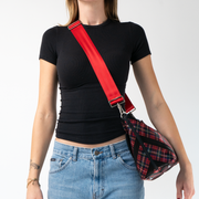 A Scarlet Click N Carry being used by a model