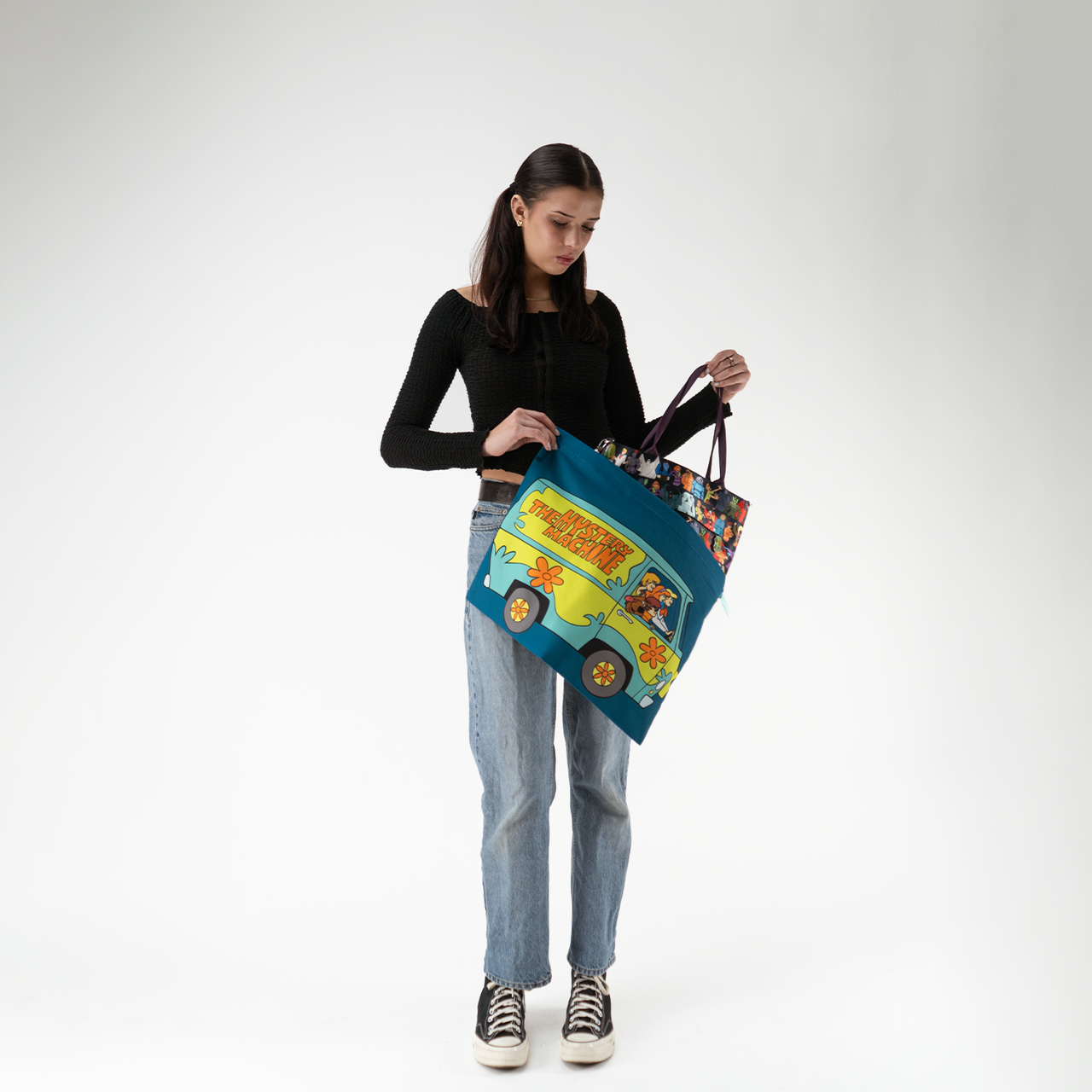 Mystery Machine Dust Bag being used by a model