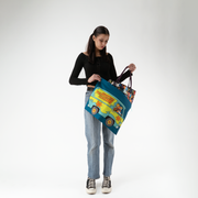 Mystery Machine Dust Bag being used by a model