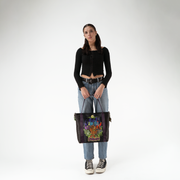 Large Poster Tote in Scooby-Doo Monsters in a models hands
