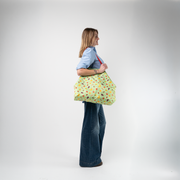 A Picnic Large Shopper Tote being used by a model