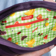 The inside of a Grape Soda Sydney Clutch