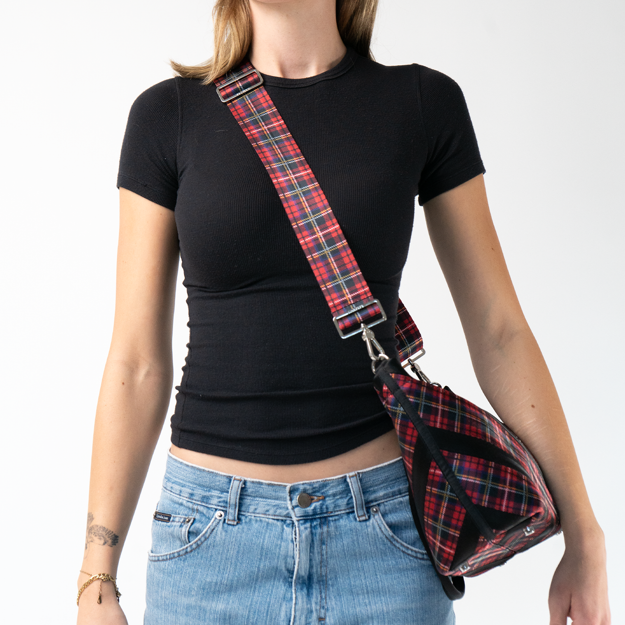The Tartan Click N Carry being used by a model