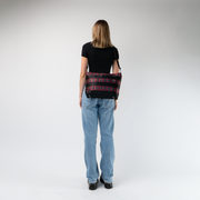 The Tartan Medium Streamline Tote being worn by a model