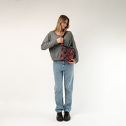 The Tartan Mini Messenger being worn by a model