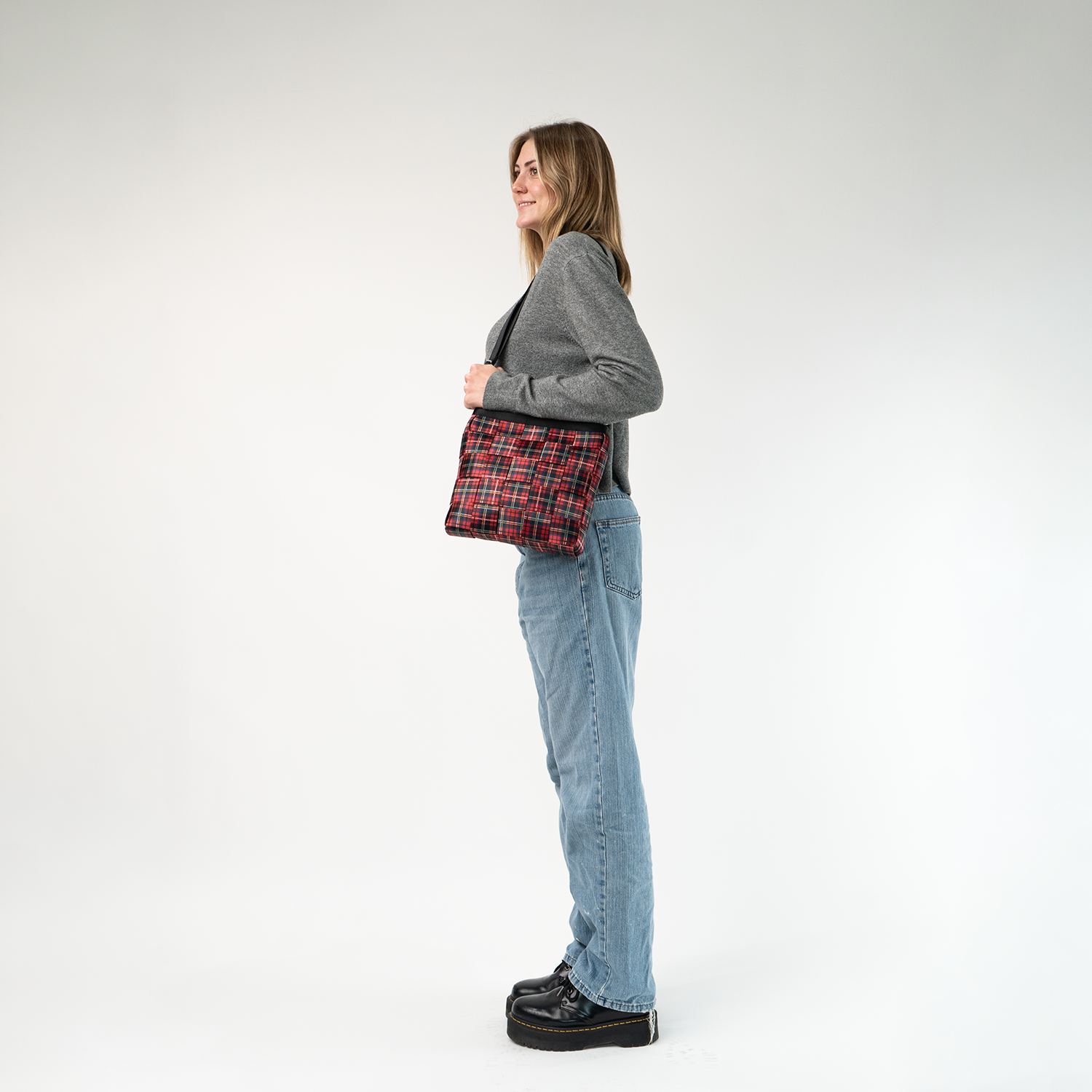 The Tartan Mini Messenger being worn by a model