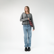 The Tartan Mini Messenger being worn by a model