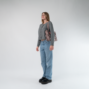 A Large Tote in Taupe being worn by a Model