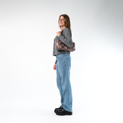 A Satchel in Taupe being worn by a Model