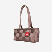 Side view of a Satchel in Taupe