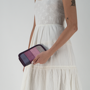 A Classic Wallet in Twilight in a models hand