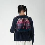 A Parkhopper in Twilight being worn like a backpack