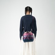 A Parkhopper in Twilight being worn crossbody