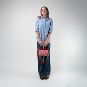 A Red Gingham Woven Petite Tote being used by a model